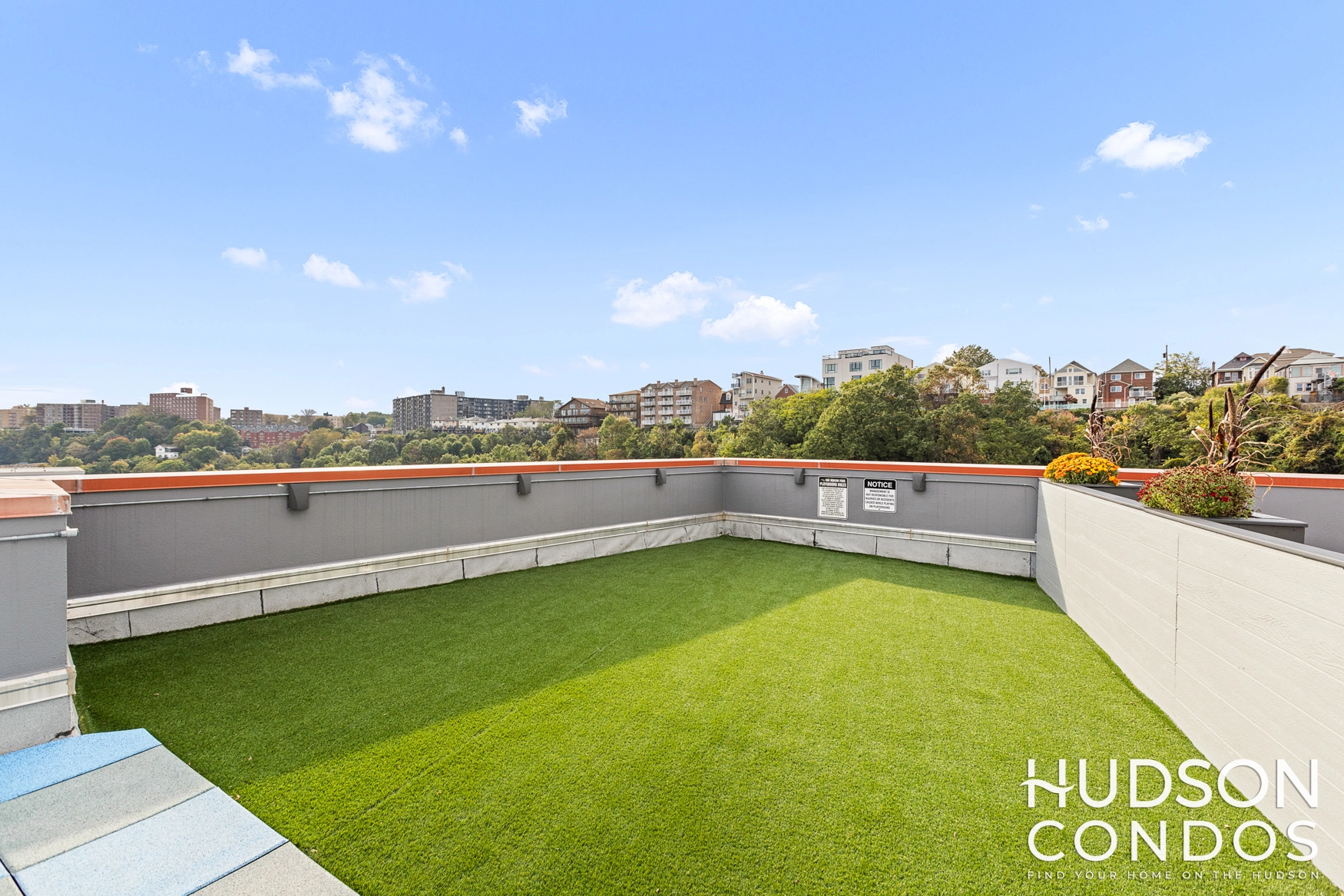 outdoor play area at one hudson park condominiums